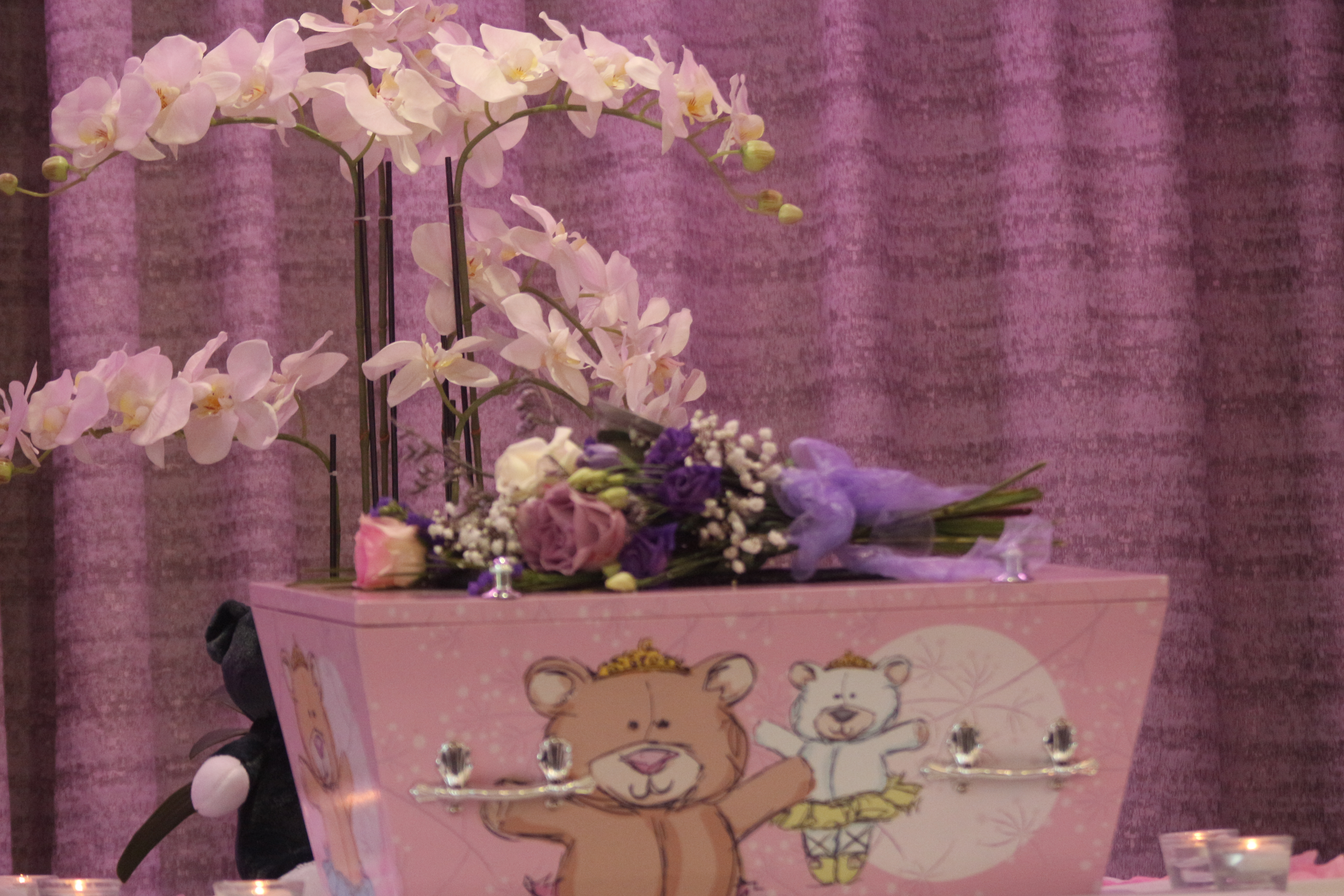 Baby's casket with flowers